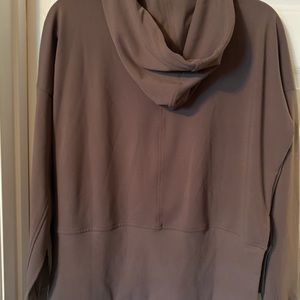 Cute hoodie. 70% nylon 20% spandex. Never worn.